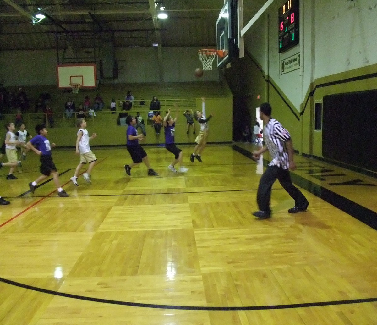 Image: Levi lays it up — Levi finishes the fast break against Hillsboro Royal Blue.