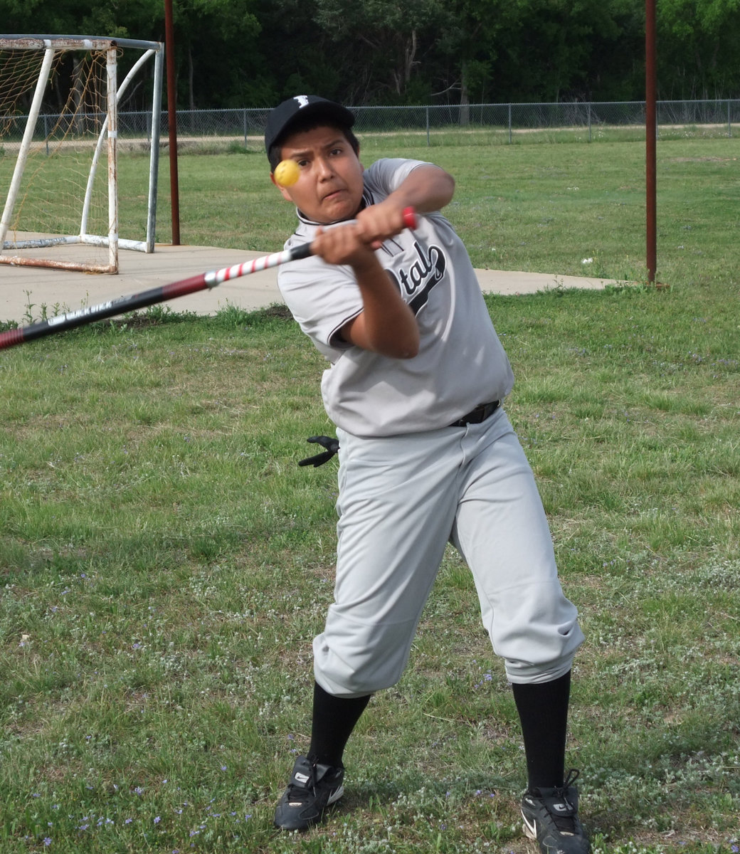 Image: Victor-y will be ours! — Victor realizes the season is a marathon. While Vic concentrates on his hitting drill, he still keeps one eye on the 1st place prize.