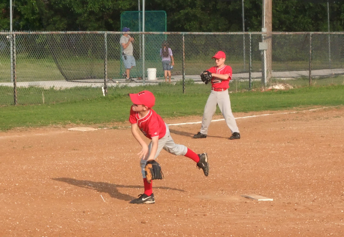 Image: Garret Janek — Garret Janek delivers the fastball….STRIKE 3!