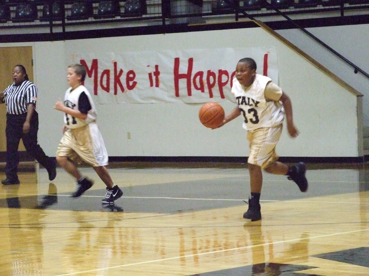 Image: Italy’s #41 Bailey Walton and #33 Darol Mayberry — The Italy 7th grade boys made it happen against Waxahachie Advantage winning 43-23. The 8th grade boys faired well also, winning their match with the Eagles 37-33.