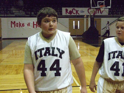 Image: I knew it was going in — Italy’s Kevin “Big Shot” Roldan is not even off the court yet and already bragging to his buddy, Bailey Walton #41, about that 3-point shot Roldan made. I guess he’s going to Disney World now. Good job, Kev!