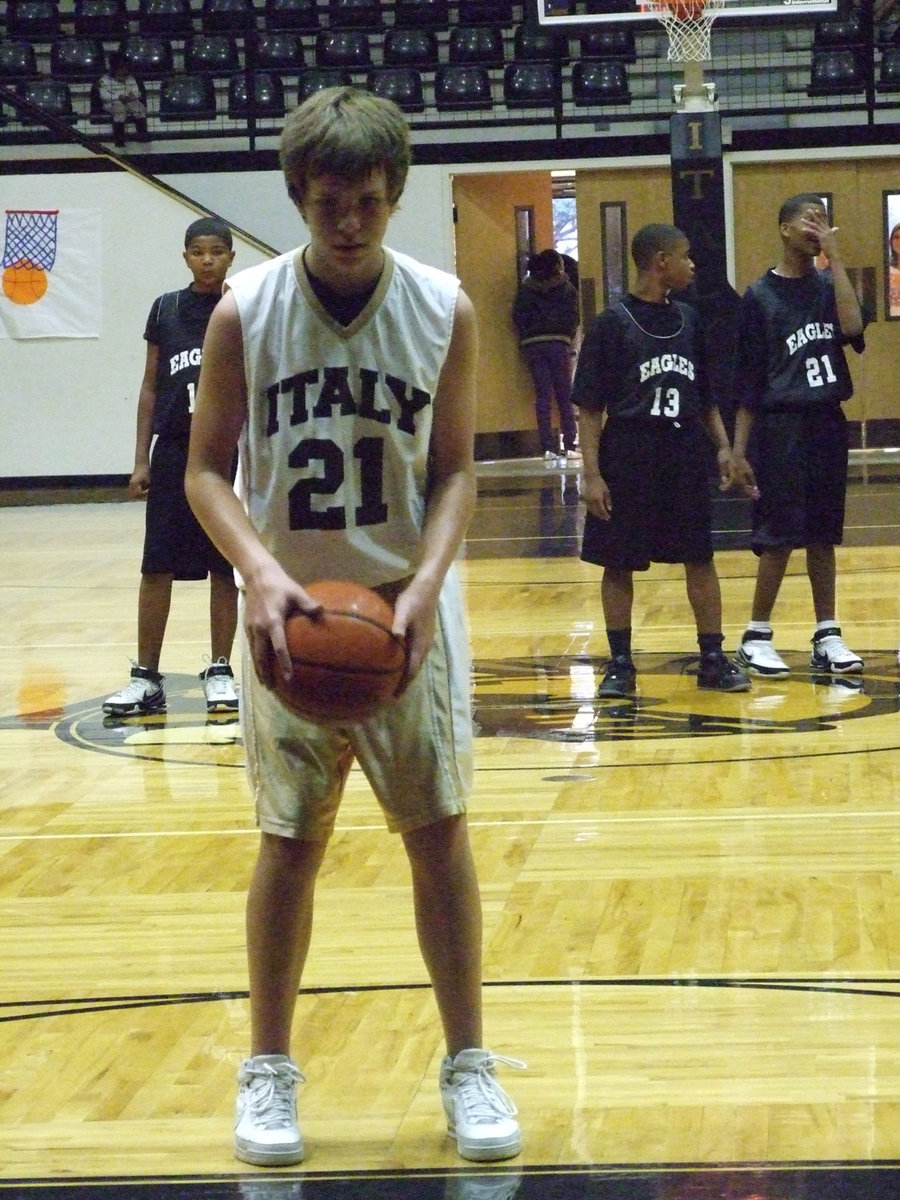 Image: Cole stays calm — Italy’s Cole Hopkins #21 prepares to try a free shot.