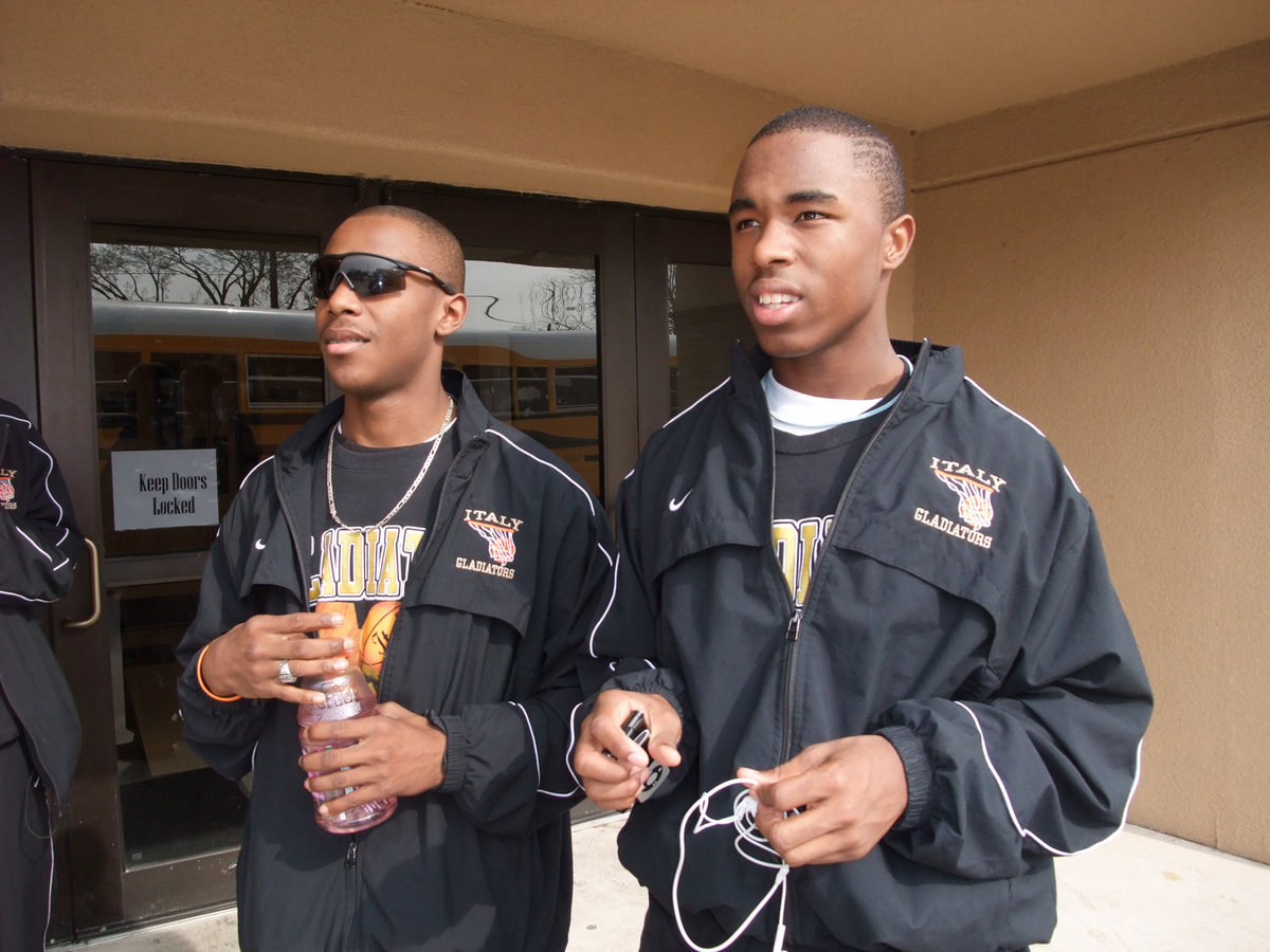 Image: Cousins of Chaos — The “Cousins of Chaos,” Desmond and Jasenio keep their emotions in check before the game.