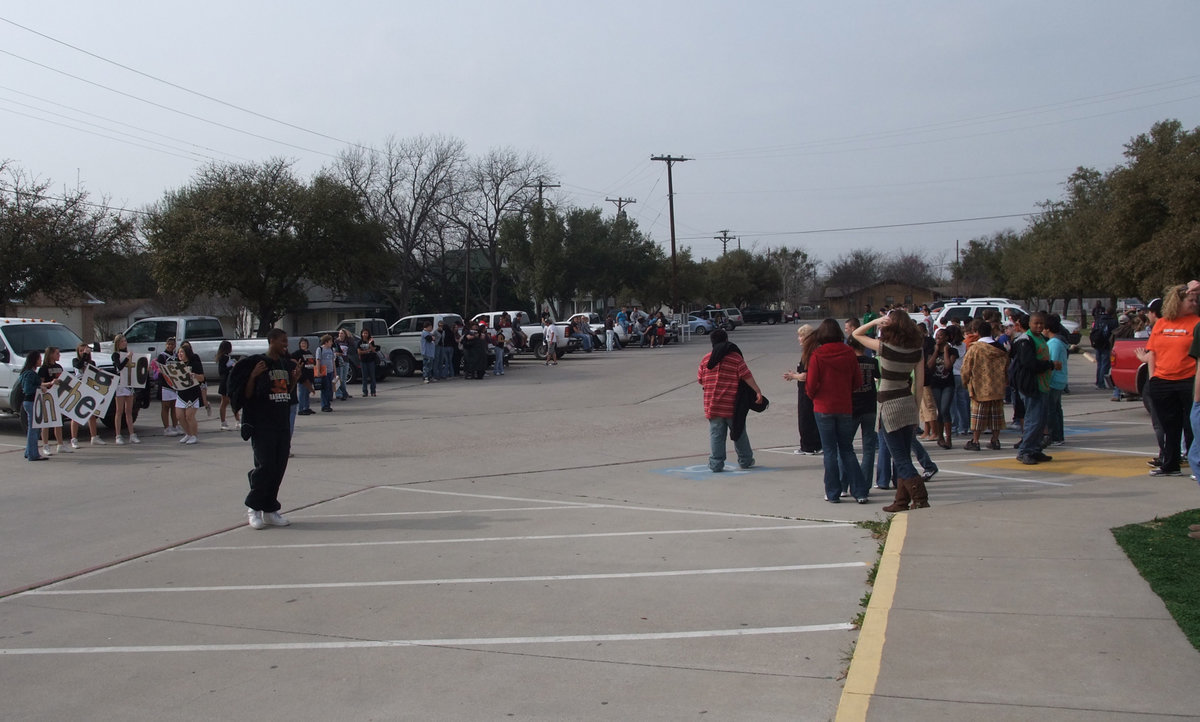 Image: We got spirit! — The Italy student body forms spirit lines to cheer for the team as they exit the parking lot.