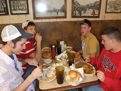 Image: Loading up — Several Italy fans stop off in Hico, Texas for a bite to eat before the game in Dublin, Texas.