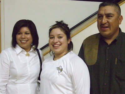 Image: Blanca’s parents — Senior Blanca Figueroa is escorted by her parents on Senior Night making Blanca’s final home game a memorable one.