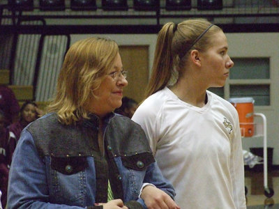 Image: Anne and Becca — Italy Senior, Becca DeMoss, gets escorted by her mom, Anne Sutherland, during Senior Night.