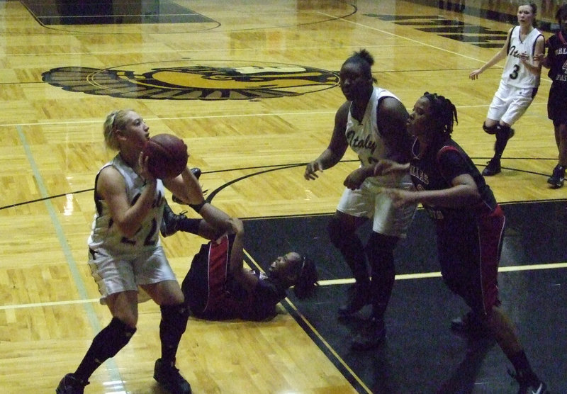 Image: Steamrolling — Megan Richards #22 gets the hot shooting hand just in time scoring 16-points in the last two games helping the Lady Gladiators steamroll into the playoffs.