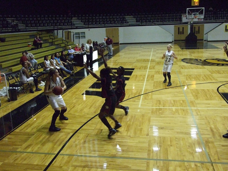 Image: DeMoss draws attention — Senior Becca DeMoss #5 draws a crowd wherever she goes on and off the court. DeMoss is a special young lady with a bright future.