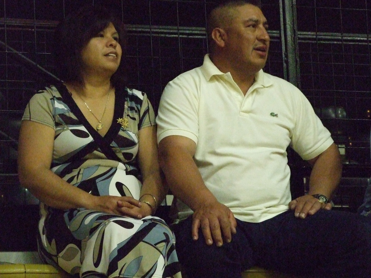 Image: Blanca’s parents — Senior Blanca Figueroa’s parents support her on Parent’s Night.