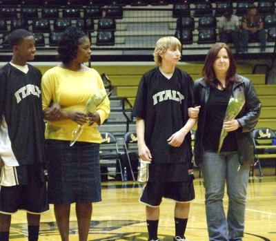 Image: Aaron and Donald — Aaron Thomas and Donald Walton get introduced with their mothers on Parent’s Night