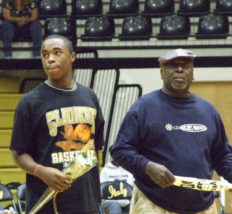 Image: Jasenio and Willie — The Dynamic Duo, Jasenio Anderson and his Dad Willie Henderson, get honored with applause.