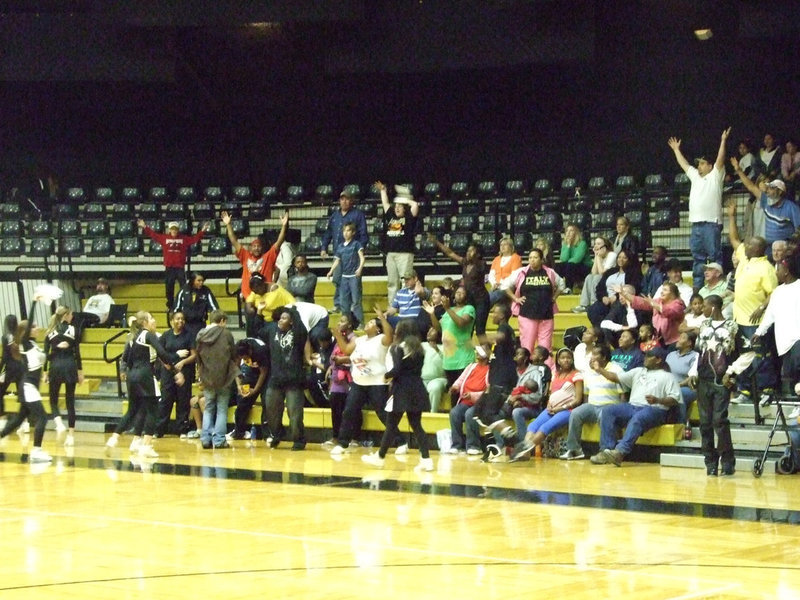 Image: Cheerleaders reward fans — The Italy Cheerleaders reward Gladiator fans by throwing shirts in to the crowd.