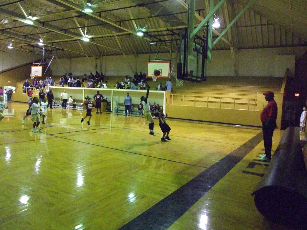 Image: Smith Scores — Italy 9’s #18 Taron “The Talent” Smith lays in two of his 30-points he scored against Hillsboro Maroon. Smith also had a 3-pointer in the game helping his squad win 30-24.