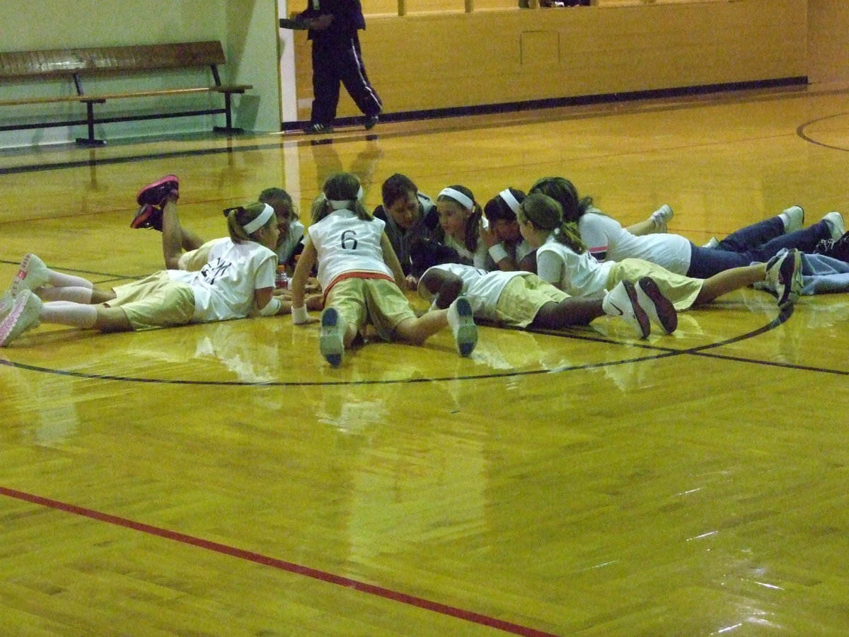 Image: Meeting At Midcourt — Tina Haight and Casey Holden circle the wagons against Italy 13.