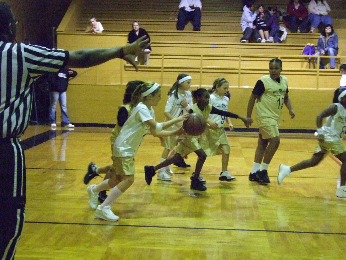 Image: DeBorde Dribbles — Brooke DeBorde pushes the ball up the court for Italy 14.