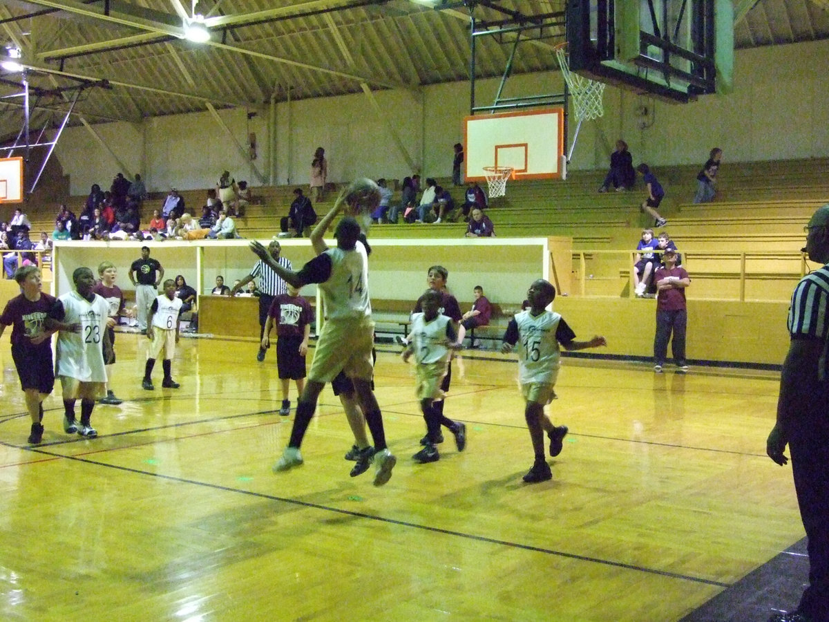 Image: Block Party — In the Boys 5th &amp; 6th division, Italy 29, head coached by Ken Norwood invites Hillsboro Maroon to a block party. Italy 29 earned a hard fought victory 36-25.