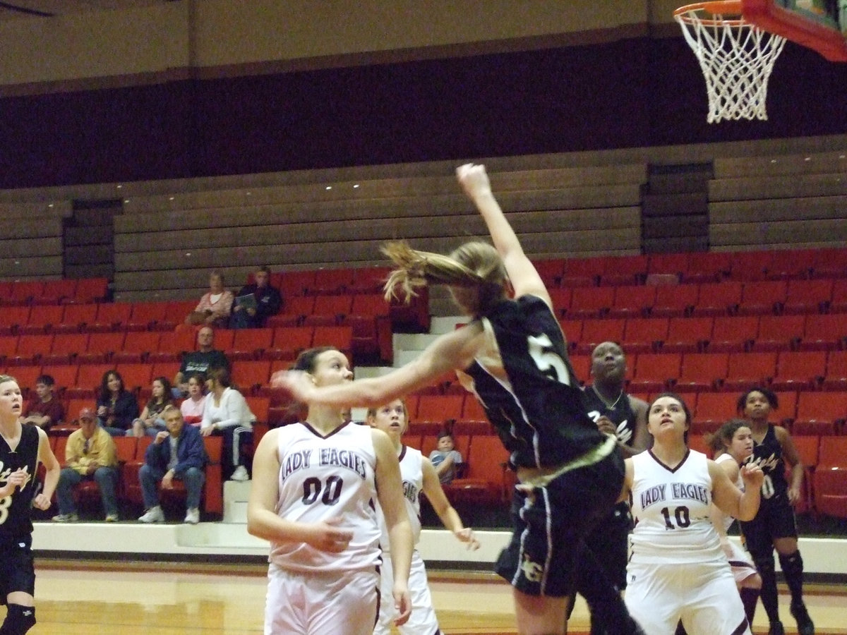 Image: DeMoss Shoots — Daredevil and a coach’s dream, #5 Becca DeMoss shoots a runner from the baseline.