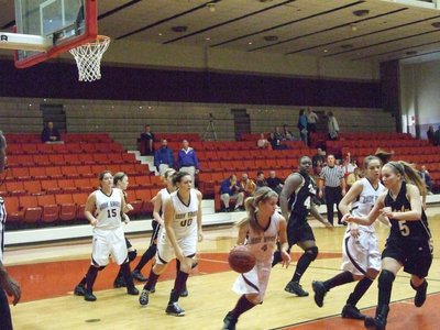 Image: DeMoss Pressures — Italy’s #5 Becca DeMoss tries to slow down the Mildred fast break.
