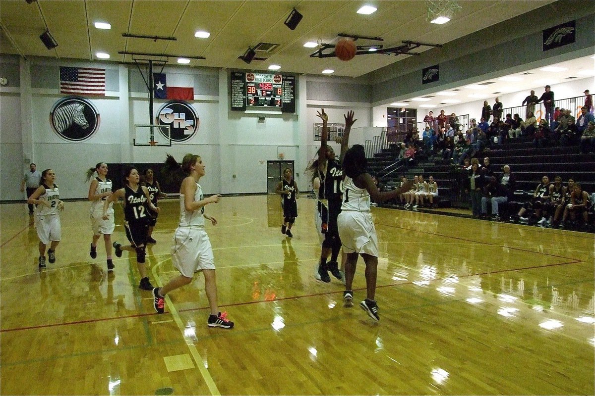 Image: Kendra scores — Italy’s Kendra Copeland(10) pulls up for a jumper over a Zebra defender during the girls JV game.