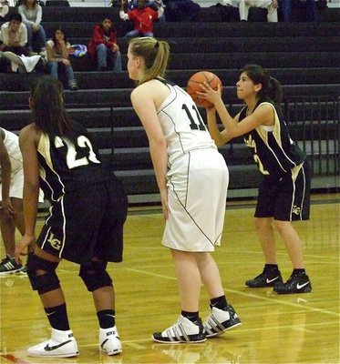 Image: Alma zones in — Italy’s Alma Suaste(32) goes to the line against the Grandview JV Lady Zebras while teammate Bernice Hailey(22) prepares to rebound.