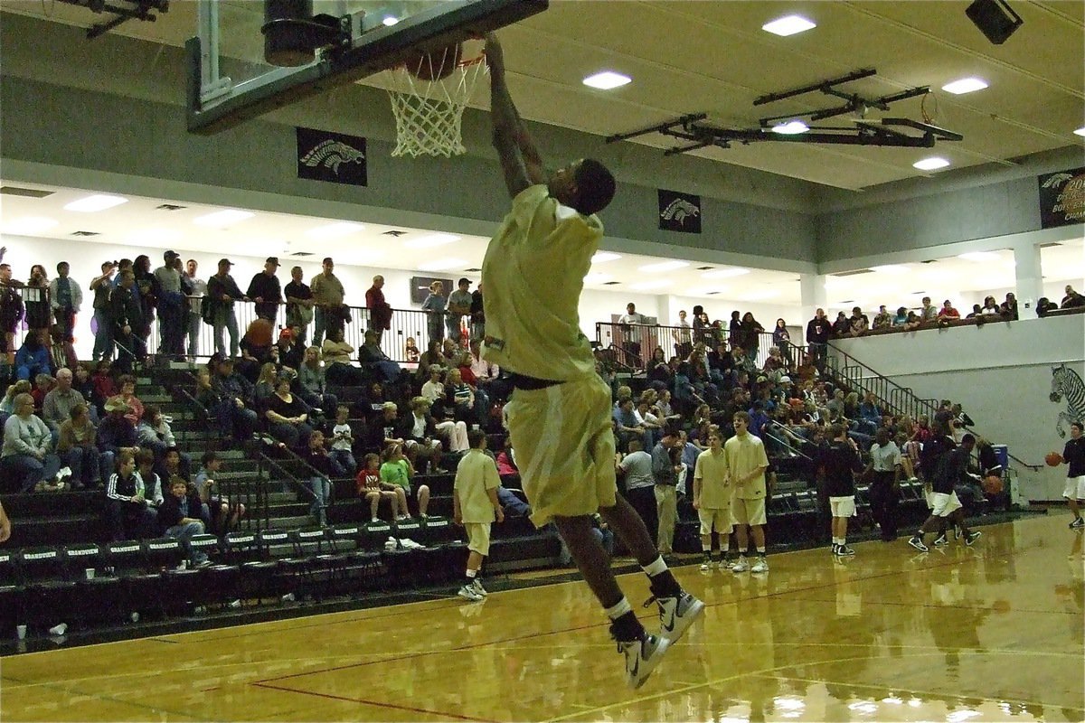 Image: Devonta displays hops — Devonta Simmons slams one home during pre-game warmups to the delight of Gladiator fans.