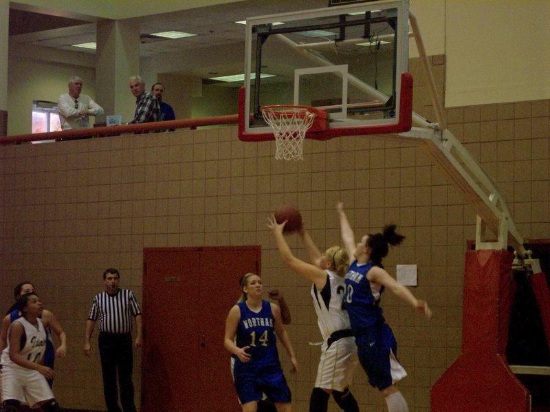 Image: Italy Tries To Rebound — The Italy Lady Gladiators try to rebound after falling behind early against the Wortham Lady Bulldogs in the 2008 Kiwanis Classic Basketball Tournament. The Tournament took place on the campus of Navarro College in Corsicana, Texas.
