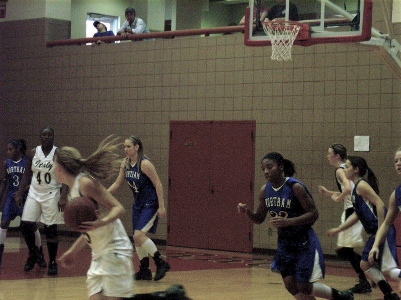 Image: DeMoss Looks To Pass — Italy’s #5 Becca DeMoss looks to pass inside to #40 Jimesha Reed.