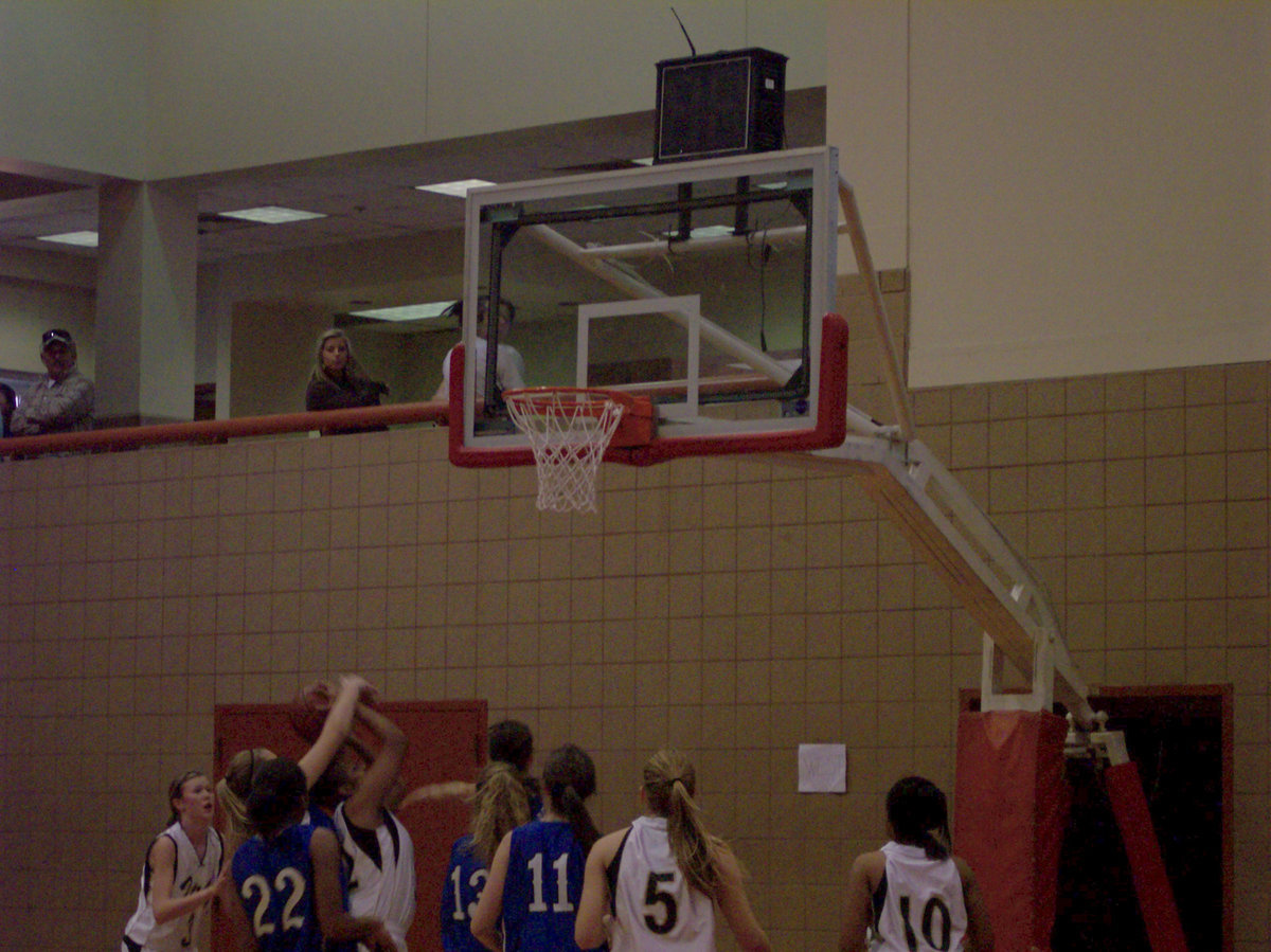 Image: Fleming Gets Fouled — Italy’s #32 Shay Fleming gets fouled going up for a basket.