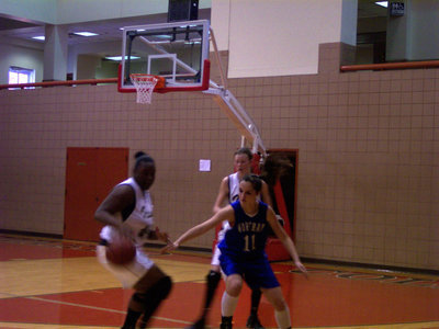 Image: Reed Steals — Italy’s #40 Jimesha Reed manages to steal the pass intended for a Wortham Player.