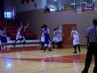 Image: Rossa Pressures Shooter — Italy’s #3 Kaitlyn Rossa refuses to allow this Wortham shooter to go uncontested.