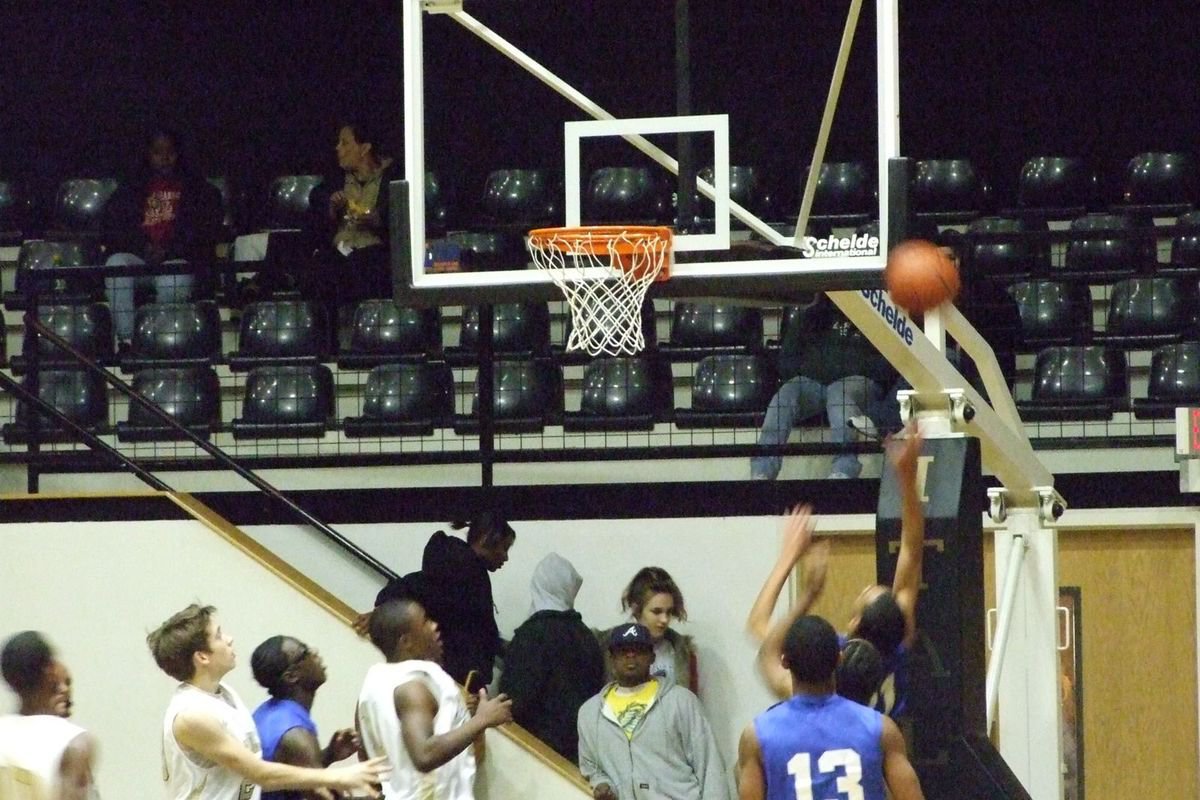 Image: Bulldogs Bank It In — Milford drives the baseline for a layup early in the 1st half.