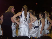 Image: Rallying The Troops  — Head Coach Stacy McDonald tries to rally her Lady Gladiators for a 2nd half comeback.
