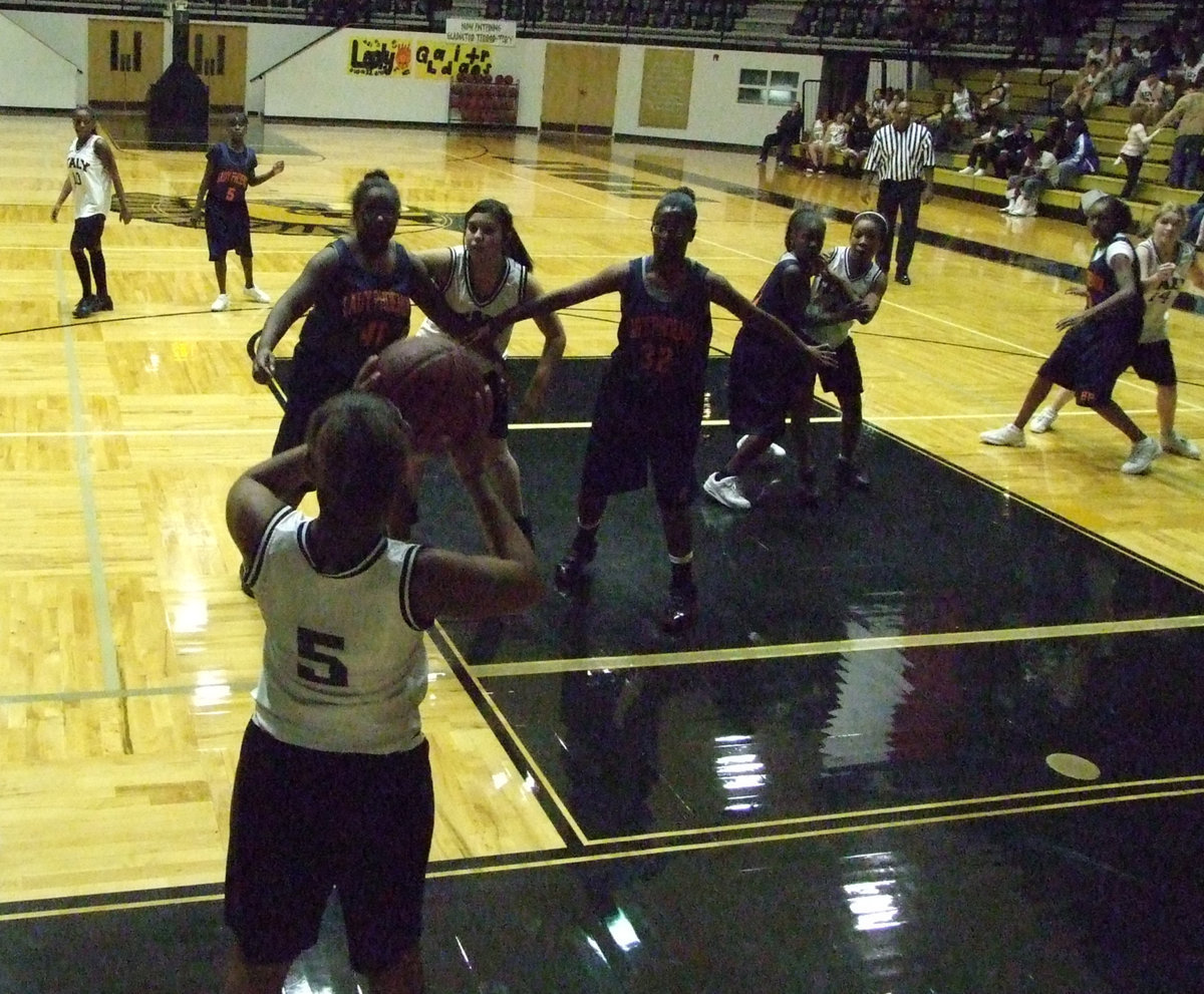 Image: Harper brings in the ball — The Italy 7th grade girls played hard against Hampton on Monday.