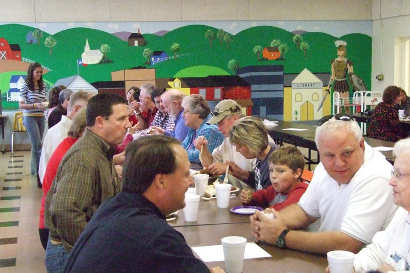 Image: Truly a happy meal — The community is invited to participate at the George Scott dinner every year. All proceeds go to scholarships.