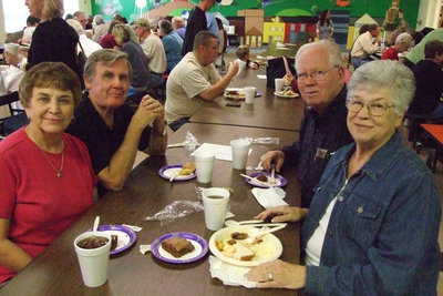 Image: Alumni says hello — On the left side of the table is Bob and Mary Sybert. Bob graduated from IHS in 1957. Mary is our guest from West High School, graduating in 1961. On the right is Jerry Lee and Margaret Sue (Riddle) Phillips. Both graduated in 1957. They have come to celebrate Homecoming.