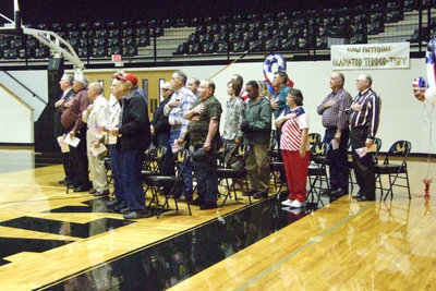 Image: The Pledge of Allegiance — Our Veterans sat in a group in the assembly