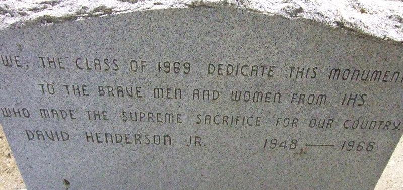 Image: The Plaque — This plaque sits at the base of the flag pole in Willis Field.