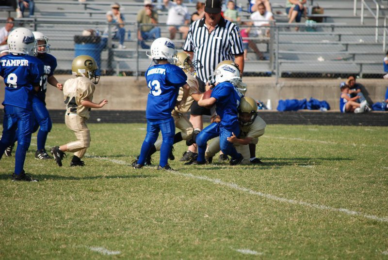 Image: Gladiators swarm the ball — The defense brought ’em down!