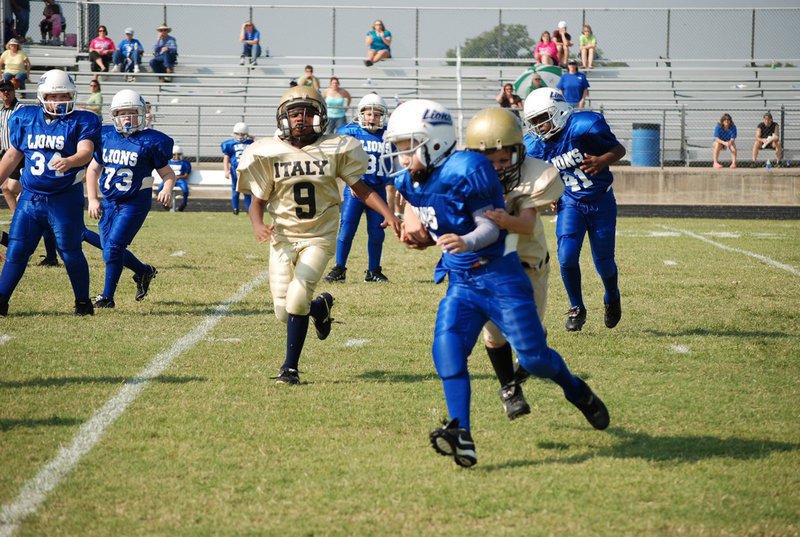 Image: Lion tamer — Italy “B” team won 14 to Blooming Grove 0 on Saturday.