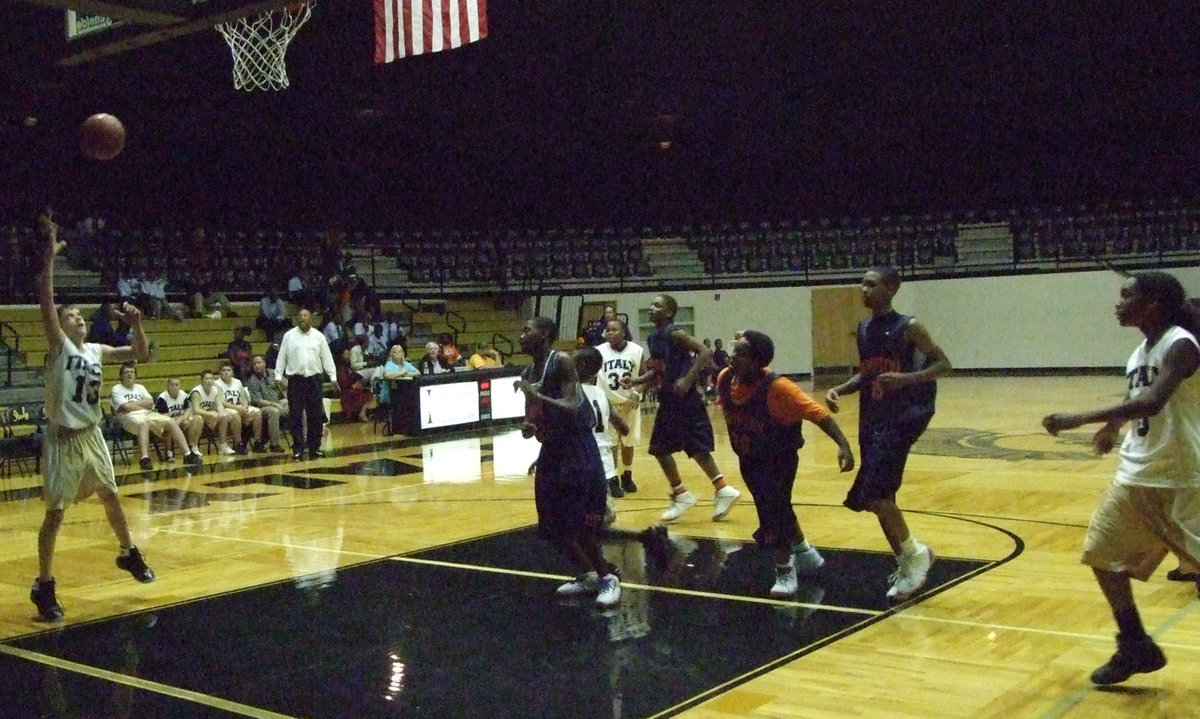 Image: Wood is open — #13 Justin Wood tries to haul-in a pass before Hampton’s defense can recover.