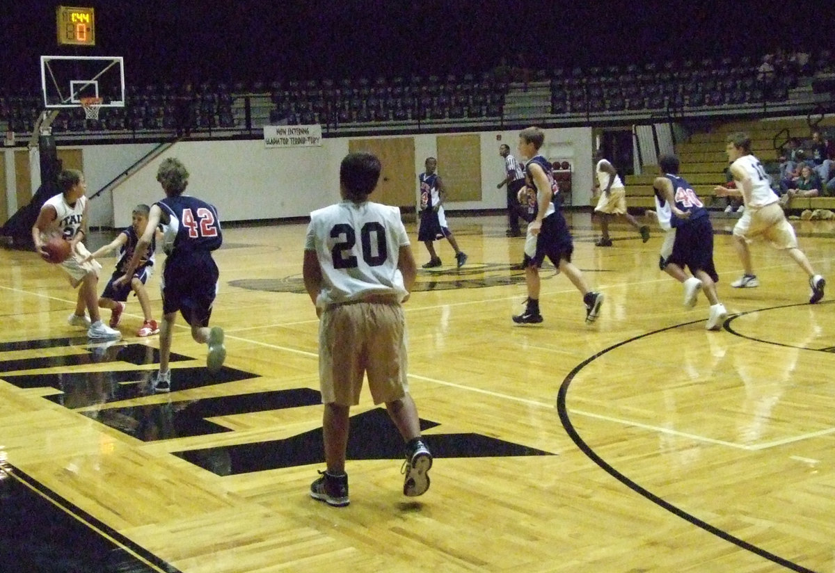 Image: Gladiators Fast Break — Hopkins tries to pass ahead to Adrian Reed on the fast break.