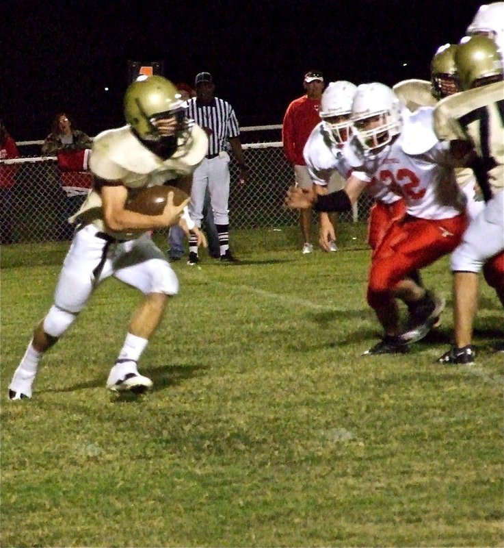 Image: Chase is on — Italy’s Chase Hamilton(10) finds running room against the Longhorns.