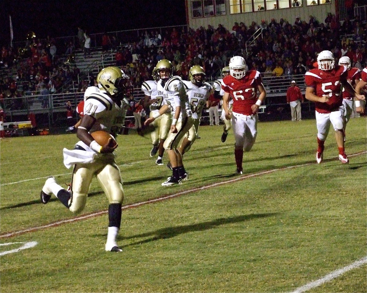 Image: The ‘Beast’ is loose — Jasenio Anderson(11) finds running space down Italy’s sideline.