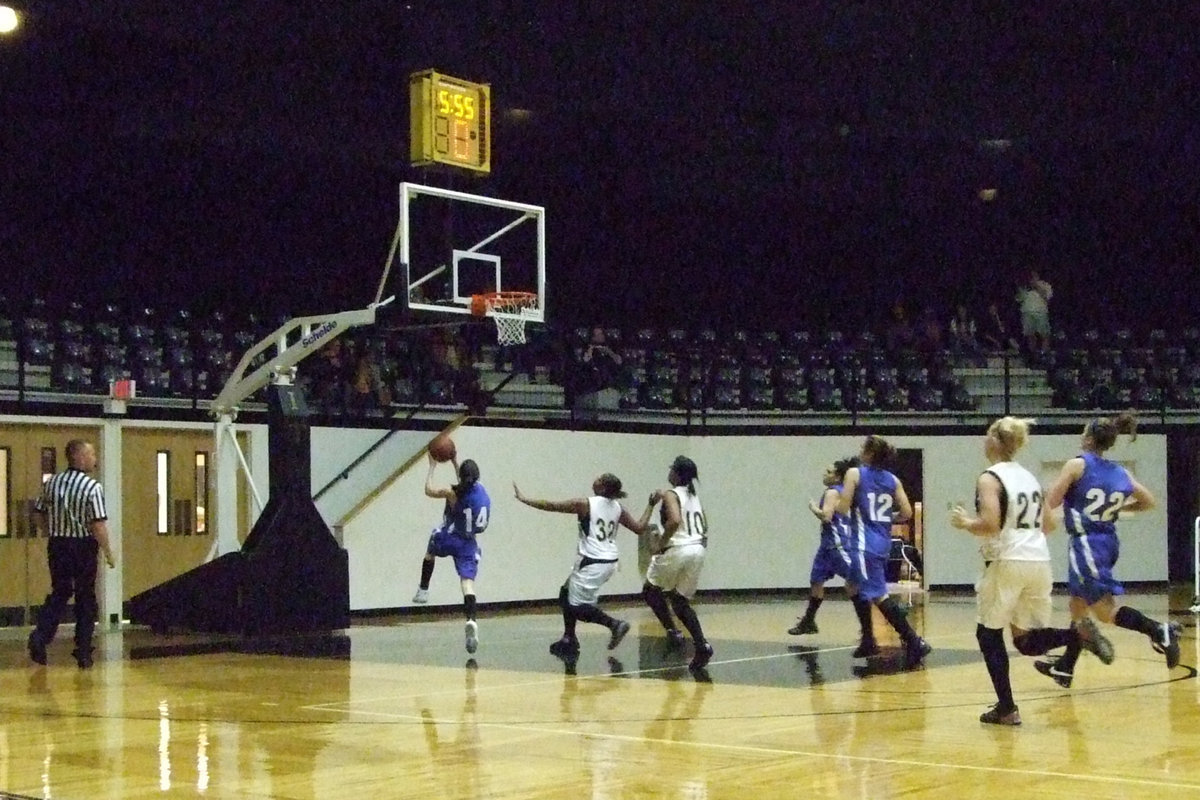 Image: Rice Sinks Two More — #14 Caitlyn Shepard was able to get two points against the Lady Gladiators.