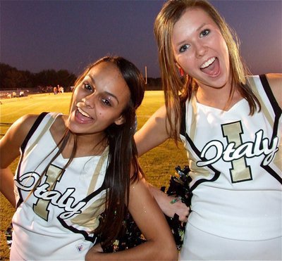 Image: Overly excited — IHS Cheerleaders Anna Viers and Kaitlyn Rossa do their part to encourage the team.
