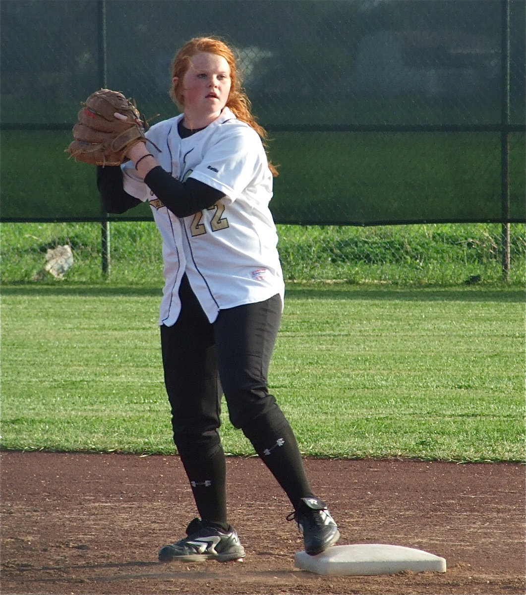 Image: I dare you… — Katie Byers holds the Red Oak runner on first base.