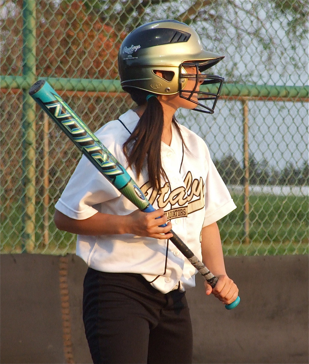 Image: Lupita takes the sign — And then the Lady Hawks took it right on the beak after Lupita Luna hit a triple.