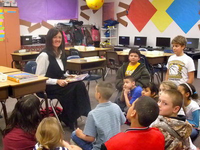 Image: Teri Murdock City Secretary — Teri took time out of her busy schedule to have some fun reading to Mrs. Dorazil’s fourth grade class.