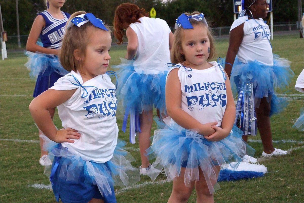 Image: Twin pups — The Milford Pups performed during the pre-game show.